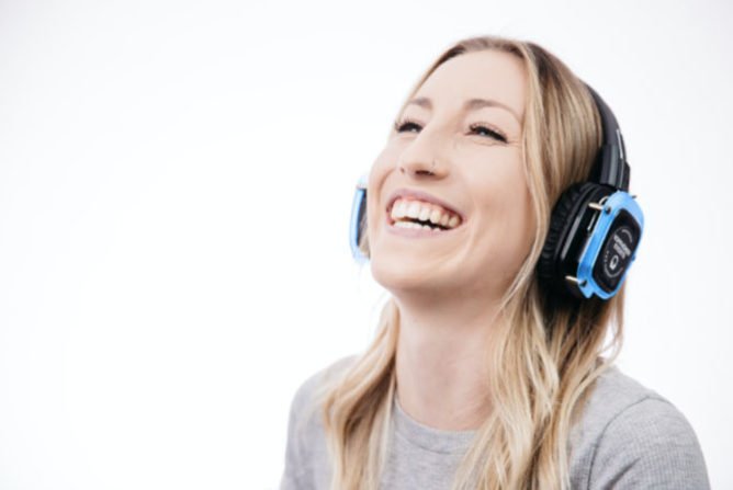 girl wearing silent headphones