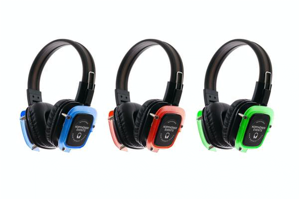 three different color headphones in green red and blue