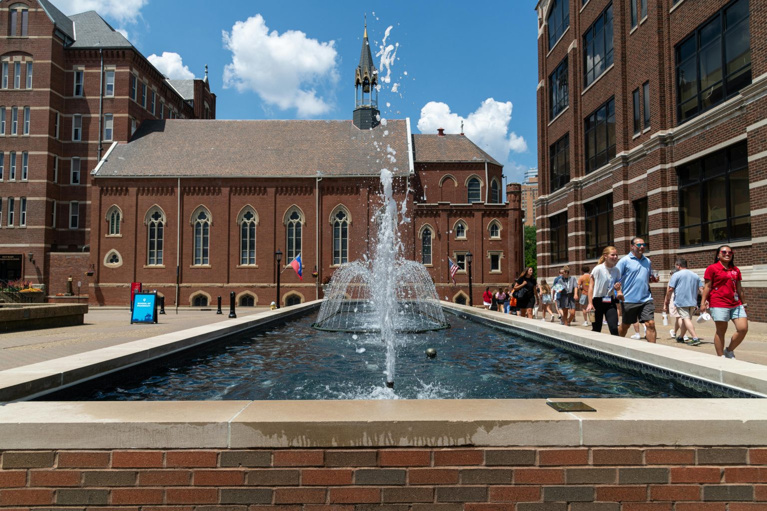 Students walking near Washington University in St. Louis, Missouri, where Party Headphones® provides silent disco headphone rentals for campus events and student activities.