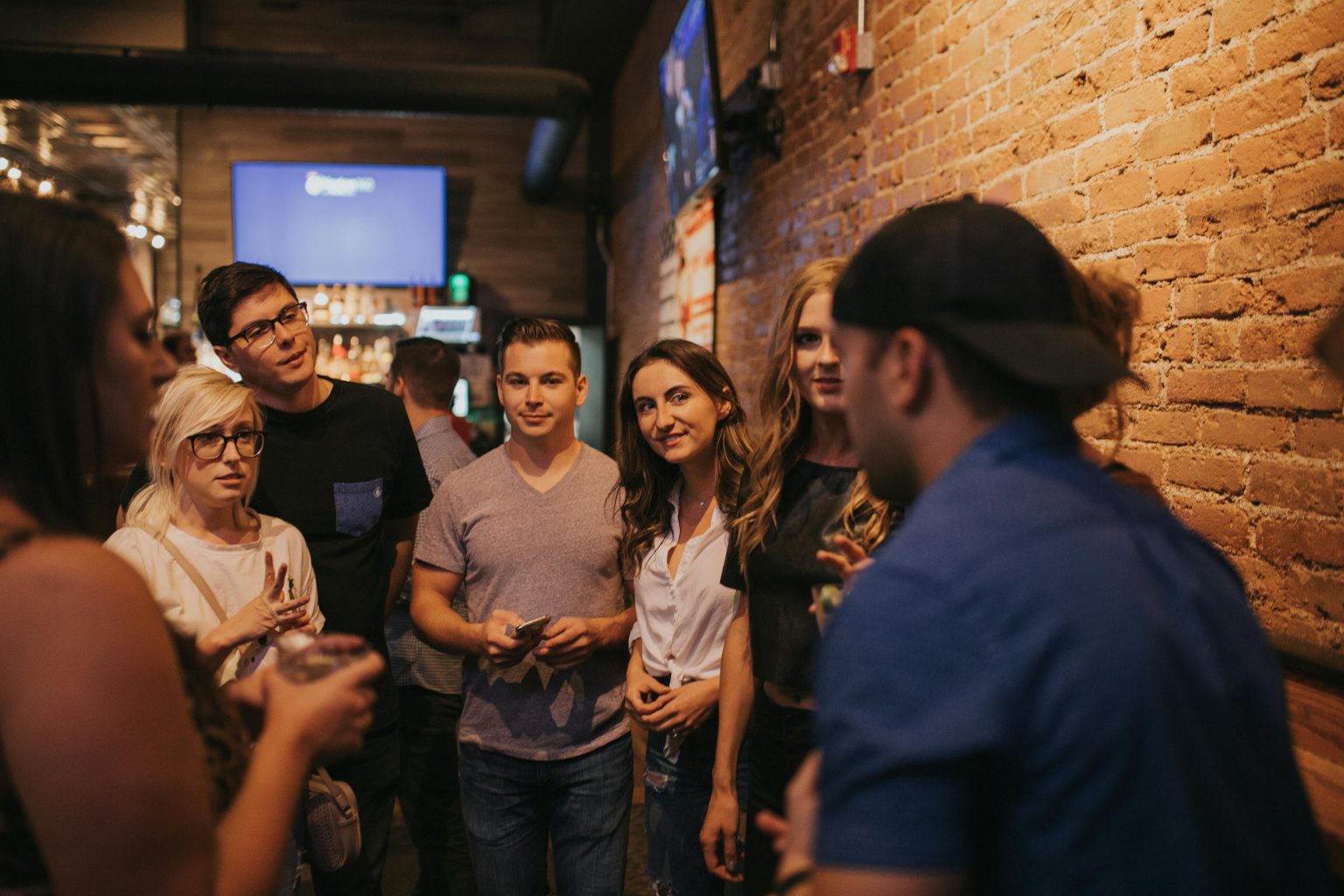 Guests socializing at a private party in Central West End, St. Louis, Missouri, where Party Headphones® offers silent disco headphone rentals for events.